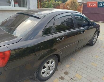 Черный Шевроле Лачетти, объемом двигателя 1.6 л и пробегом 293 тыс. км за 3700 $, фото 4 на Automoto.ua