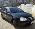 Черный Шевроле Лачетти, объемом двигателя 1.8 л и пробегом 227 тыс. км за 3750 $, фото 1 на Automoto.ua