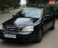 Черный Шевроле Лачетти, объемом двигателя 1.6 л и пробегом 227 тыс. км за 3600 $, фото 1 на Automoto.ua