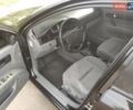 Черный Шевроле Лачетти, объемом двигателя 1.8 л и пробегом 297 тыс. км за 6100 $, фото 9 на Automoto.ua