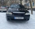 Черный Шевроле Лачетти, объемом двигателя 1.6 л и пробегом 273 тыс. км за 3600 $, фото 1 на Automoto.ua