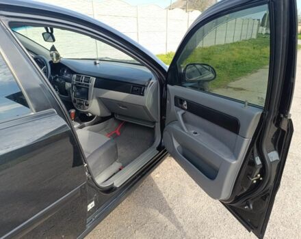 Черный Шевроле Лачетти, объемом двигателя 1.8 л и пробегом 241 тыс. км за 4500 $, фото 5 на Automoto.ua