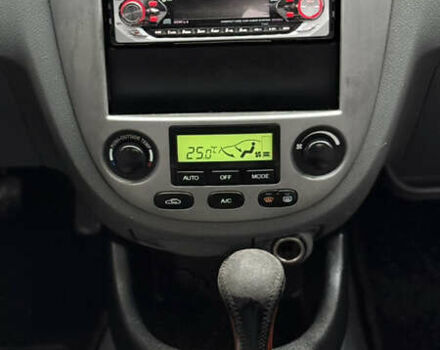 Черный Шевроле Лачетти, объемом двигателя 1.8 л и пробегом 190 тыс. км за 3650 $, фото 12 на Automoto.ua