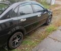 Черный Шевроле Лачетти, объемом двигателя 1.8 л и пробегом 256 тыс. км за 4500 $, фото 2 на Automoto.ua