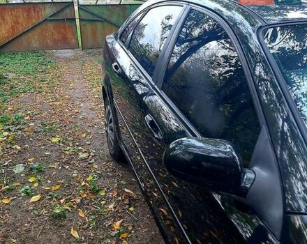 Черный Шевроле Лачетти, объемом двигателя 1.8 л и пробегом 203 тыс. км за 3800 $, фото 2 на Automoto.ua