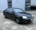 Черный Шевроле Лачетти, объемом двигателя 1.8 л и пробегом 220 тыс. км за 2950 $, фото 2 на Automoto.ua