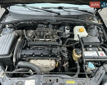 Черный Шевроле Лачетти, объемом двигателя 1.6 л и пробегом 280 тыс. км за 2999 $, фото 45 на Automoto.ua