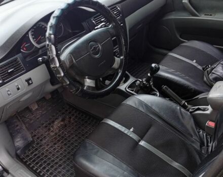 Черный Шевроле Лачетти, объемом двигателя 1.8 л и пробегом 256 тыс. км за 4500 $, фото 8 на Automoto.ua