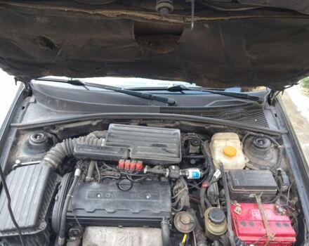 Черный Шевроле Лачетти, объемом двигателя 1.8 л и пробегом 307 тыс. км за 2700 $, фото 12 на Automoto.ua