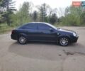 Черный Шевроле Лачетти, объемом двигателя 1.8 л и пробегом 297 тыс. км за 6100 $, фото 2 на Automoto.ua