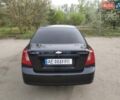 Черный Шевроле Лачетти, объемом двигателя 1.8 л и пробегом 297 тыс. км за 6100 $, фото 4 на Automoto.ua