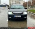 Черный Шевроле Лачетти, объемом двигателя 1.8 л и пробегом 210 тыс. км за 2550 $, фото 1 на Automoto.ua