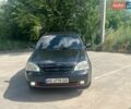 Черный Шевроле Лачетти, объемом двигателя 1.6 л и пробегом 220 тыс. км за 3100 $, фото 1 на Automoto.ua