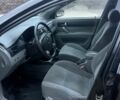 Черный Шевроле Лачетти, объемом двигателя 1.8 л и пробегом 220 тыс. км за 2950 $, фото 8 на Automoto.ua