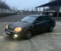 Черный Шевроле Лачетти, объемом двигателя 1.8 л и пробегом 220 тыс. км за 2950 $, фото 1 на Automoto.ua