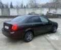 Черный Шевроле Лачетти, объемом двигателя 1.8 л и пробегом 220 тыс. км за 2950 $, фото 3 на Automoto.ua