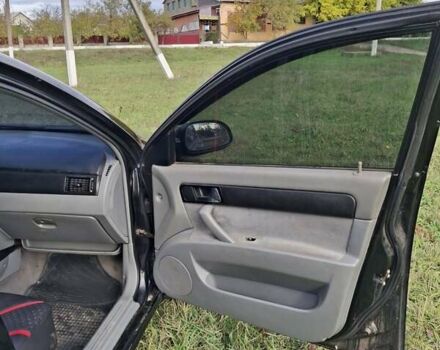 Черный Шевроле Лачетти, объемом двигателя 1.8 л и пробегом 360 тыс. км за 3300 $, фото 1 на Automoto.ua