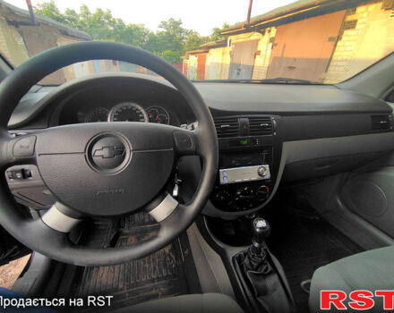 Черный Шевроле Лачетти, объемом двигателя 1.8 л и пробегом 266 тыс. км за 3450 $, фото 7 на Automoto.ua