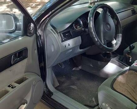 Черный Шевроле Лачетти, объемом двигателя 1.8 л и пробегом 200 тыс. км за 4300 $, фото 5 на Automoto.ua