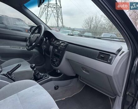 Черный Шевроле Лачетти, объемом двигателя 1.6 л и пробегом 280 тыс. км за 2999 $, фото 38 на Automoto.ua
