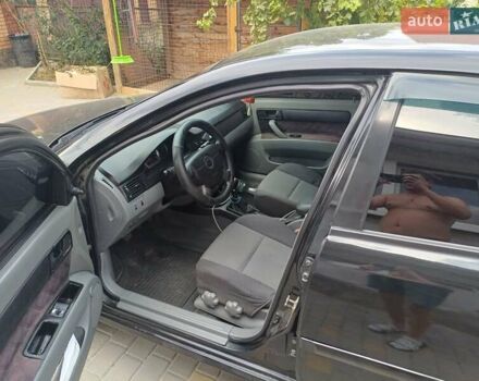 Черный Шевроле Лачетти, объемом двигателя 1.6 л и пробегом 293 тыс. км за 3700 $, фото 7 на Automoto.ua