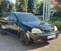 Черный Шевроле Лачетти, объемом двигателя 1.6 л и пробегом 226 тыс. км за 3899 $, фото 2 на Automoto.ua
