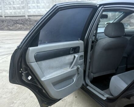 Черный Шевроле Лачетти, объемом двигателя 1.8 л и пробегом 220 тыс. км за 2950 $, фото 7 на Automoto.ua