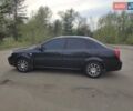 Черный Шевроле Лачетти, объемом двигателя 1.8 л и пробегом 297 тыс. км за 6100 $, фото 1 на Automoto.ua