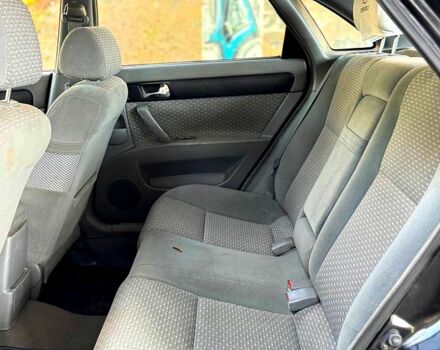 Черный Шевроле Лачетти, объемом двигателя 1.8 л и пробегом 178 тыс. км за 3350 $, фото 4 на Automoto.ua