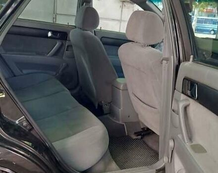 Черный Шевроле Лачетти, объемом двигателя 1.8 л и пробегом 200 тыс. км за 4300 $, фото 1 на Automoto.ua