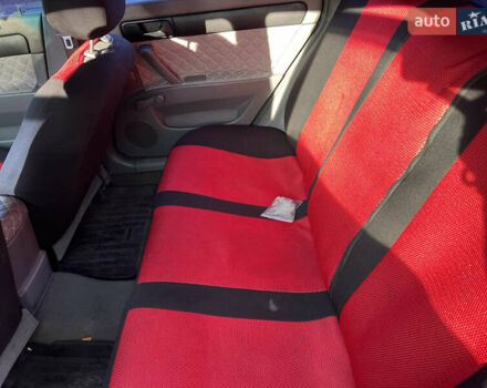 Черный Шевроле Лачетти, объемом двигателя 1.6 л и пробегом 220 тыс. км за 3300 $, фото 2 на Automoto.ua