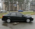 Черный Шевроле Лачетти, объемом двигателя 1.8 л и пробегом 190 тыс. км за 3650 $, фото 4 на Automoto.ua