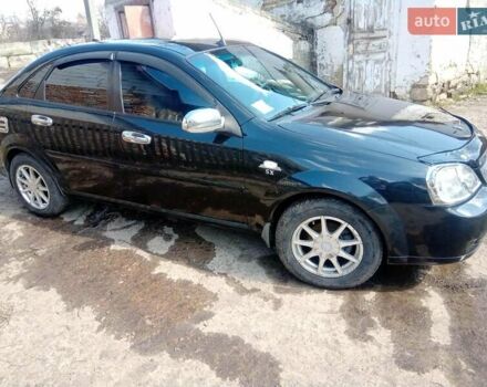Черный Шевроле Лачетти, объемом двигателя 1.8 л и пробегом 145 тыс. км за 4100 $, фото 2 на Automoto.ua
