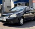 Черный Шевроле Лачетти, объемом двигателя 1.6 л и пробегом 270 тыс. км за 2600 $, фото 1 на Automoto.ua