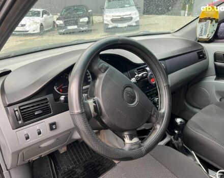 Чорний Шевроле Лачетті, об'ємом двигуна 1.6 л та пробігом 247 тис. км за 3890 $, фото 16 на Automoto.ua