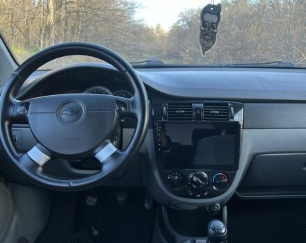 Черный Шевроле Лачетти, объемом двигателя 1.6 л и пробегом 150 тыс. км за 5300 $, фото 13 на Automoto.ua