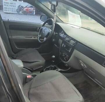 Черный Шевроле Лачетти, объемом двигателя 1.8 л и пробегом 190 тыс. км за 2900 $, фото 3 на Automoto.ua