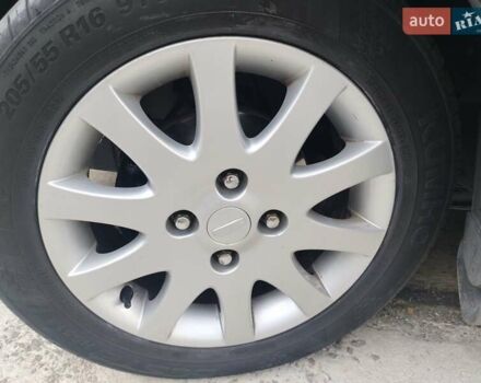 Черный Шевроле Лачетти, объемом двигателя 1.8 л и пробегом 265 тыс. км за 4600 $, фото 11 на Automoto.ua