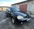 Черный Шевроле Лачетти, объемом двигателя 1.8 л и пробегом 300 тыс. км за 3950 $, фото 1 на Automoto.ua
