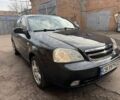 Черный Шевроле Лачетти, объемом двигателя 1.8 л и пробегом 200 тыс. км за 3200 $, фото 1 на Automoto.ua