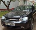 Черный Шевроле Лачетти, объемом двигателя 1.8 л и пробегом 160 тыс. км за 3700 $, фото 1 на Automoto.ua
