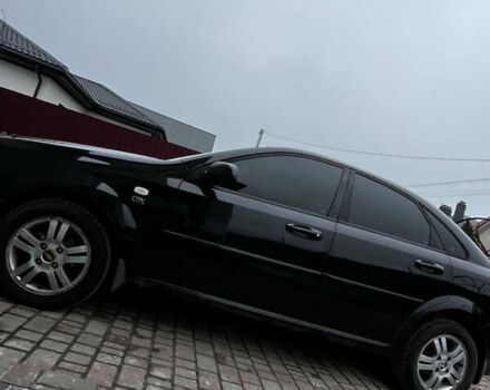 Черный Шевроле Лачетти, объемом двигателя 1.8 л и пробегом 176 тыс. км за 4550 $, фото 11 на Automoto.ua