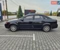 Черный Шевроле Лачетти, объемом двигателя 1.6 л и пробегом 380 тыс. км за 3990 $, фото 5 на Automoto.ua