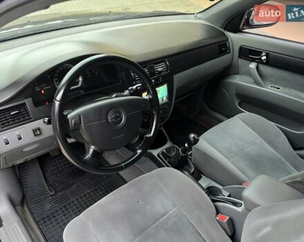 Чорний Шевроле Лачетті, об'ємом двигуна 1.8 л та пробігом 240 тис. км за 3600 $, фото 8 на Automoto.ua