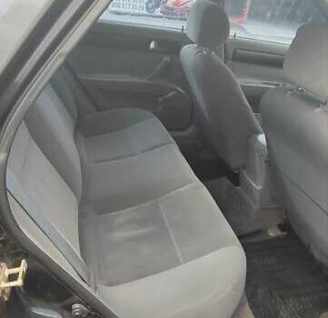 Черный Шевроле Лачетти, объемом двигателя 1.8 л и пробегом 190 тыс. км за 2900 $, фото 4 на Automoto.ua