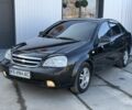 Черный Шевроле Лачетти, объемом двигателя 1.8 л и пробегом 260 тыс. км за 4100 $, фото 1 на Automoto.ua