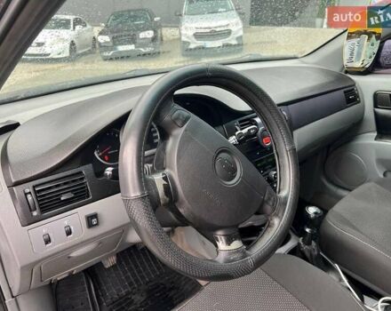 Черный Шевроле Лачетти, объемом двигателя 1.6 л и пробегом 247 тыс. км за 3890 $, фото 16 на Automoto.ua