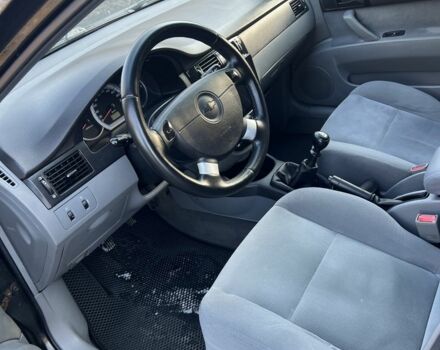 Черный Шевроле Лачетти, объемом двигателя 1.6 л и пробегом 150 тыс. км за 5300 $, фото 7 на Automoto.ua