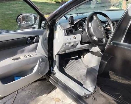 Черный Шевроле Лачетти, объемом двигателя 1.8 л и пробегом 237 тыс. км за 3850 $, фото 8 на Automoto.ua