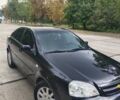 Черный Шевроле Лачетти, объемом двигателя 1.8 л и пробегом 265 тыс. км за 4600 $, фото 1 на Automoto.ua